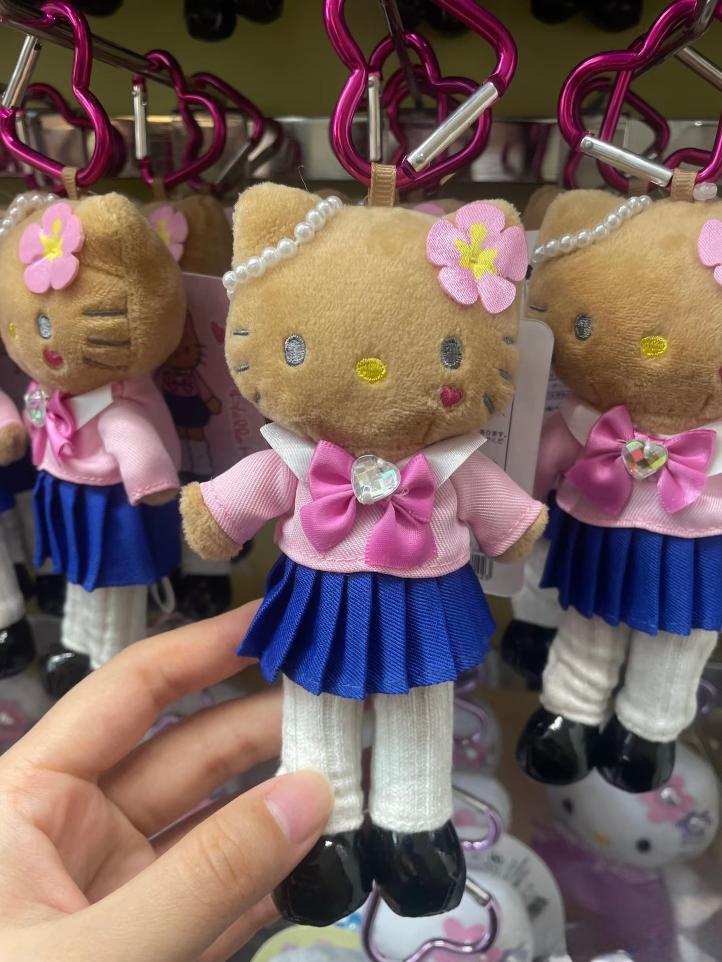 Sanrio Hello Kitty Tanned Long Leg School Uniform Mascot Keychain